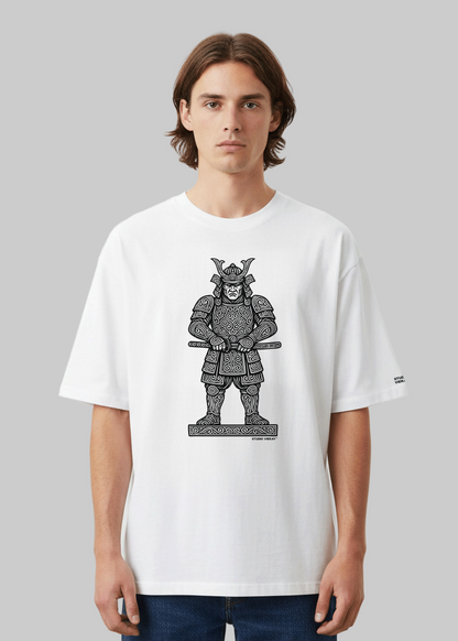 Male model wearing a white box fit Studio Viekay tee featuring black engraved Samurai linework in a premium minimalist streetwear style.