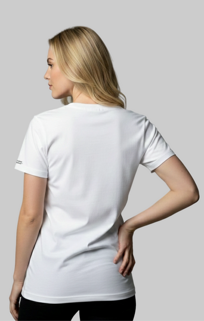 Back view of a model wearing a white Studio Viekay tee agaist the gray background.