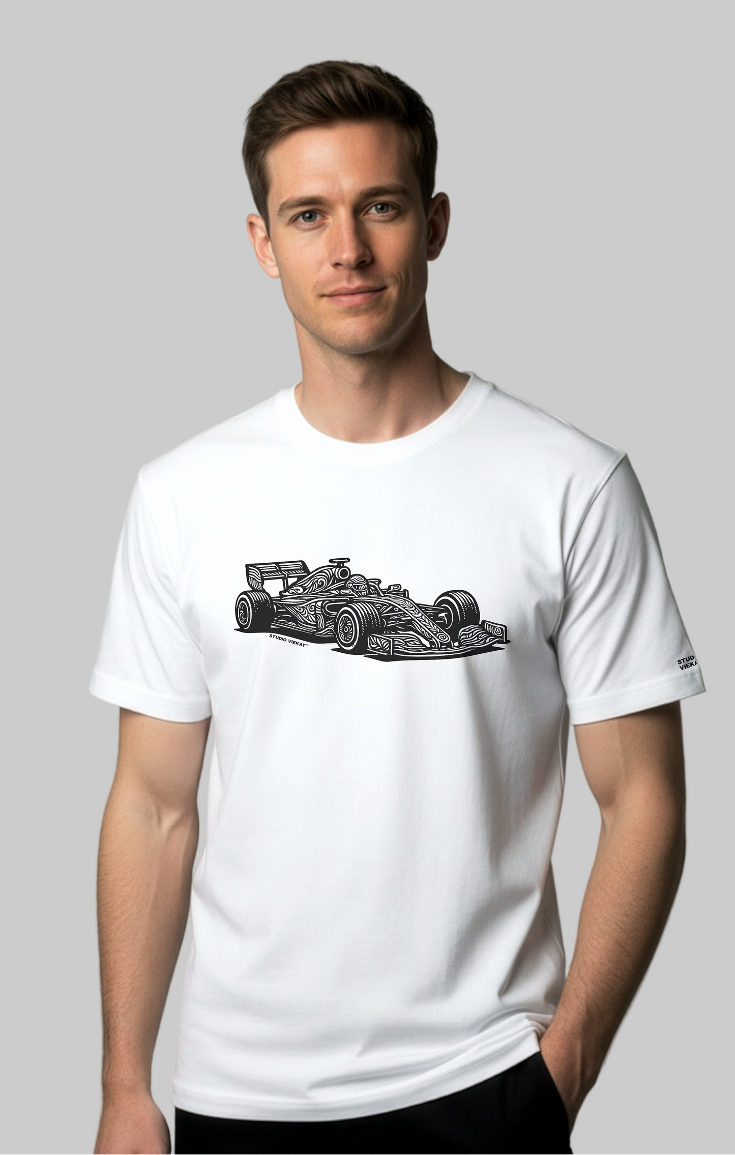 Model wearing the Studio Viekay Formula One Engraved Art Tee with bold carved formula one car artwork in clean black and white linework