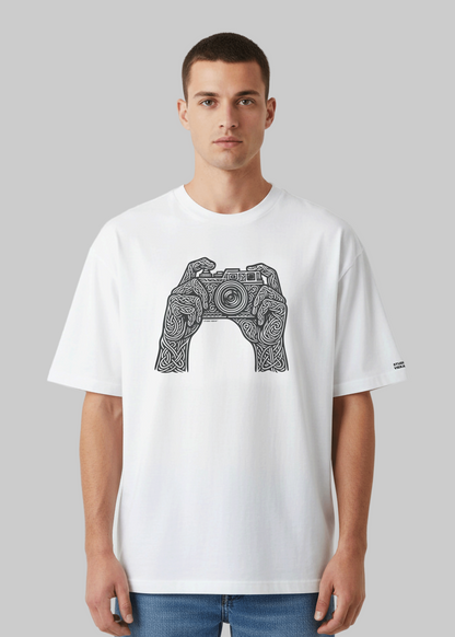 Model wearing Studio Viekay Camera Engraved Art Box Tee with carved camera artwork