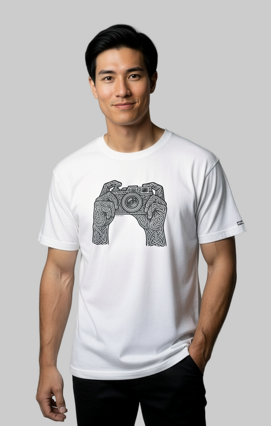 Model wearing the Studio Viekay Camera Engraved Art Tee with bold carved camera artwork in clean black and white linework