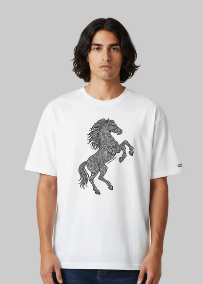 Male model wearing a white box fit Studio Viekay Stallion tee featuring black engraved Stallion linework in premium mens streetwear style.