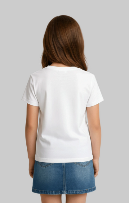 Back view of child model wearing a plain white t-shirt and blue denim skirt on a gray background