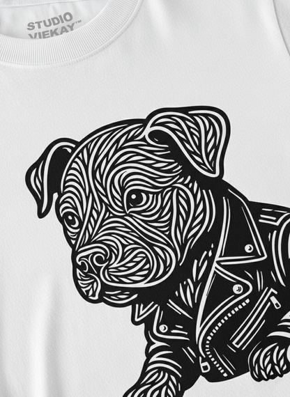 Close-up of a white t-shirt with a black and white graphic of a dog wearing a jacket.