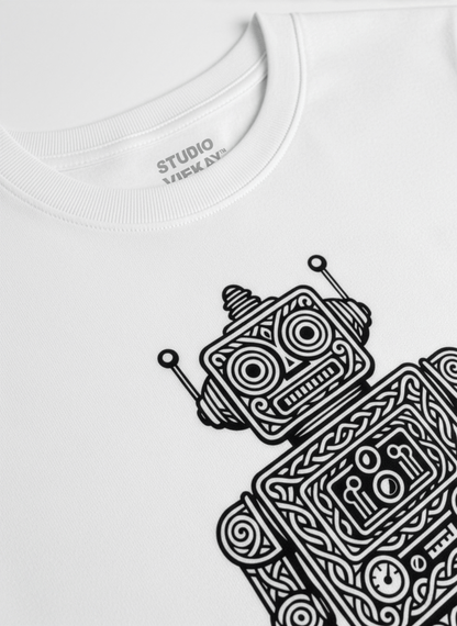 Close-up of a white t-shirt with a black retro robot graphic.