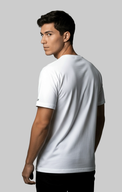 Back view of a man wearing a white Studio Viekay t-shirt against a gray background