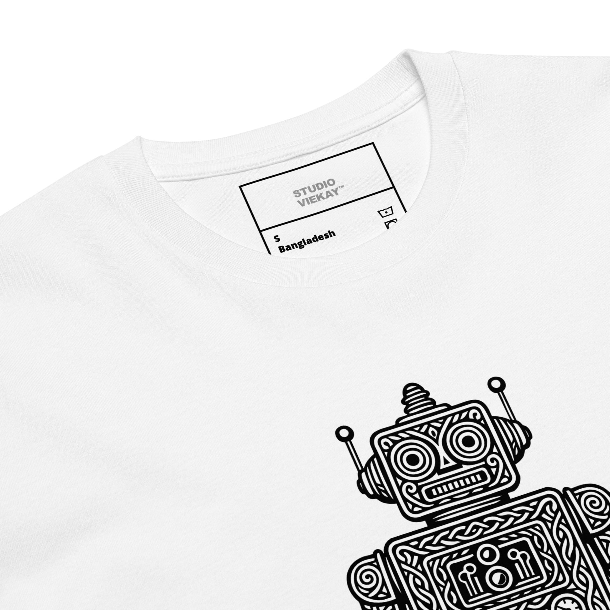 Close up of engraved black robot artwork showing crisp sculpted line detail on white cotton