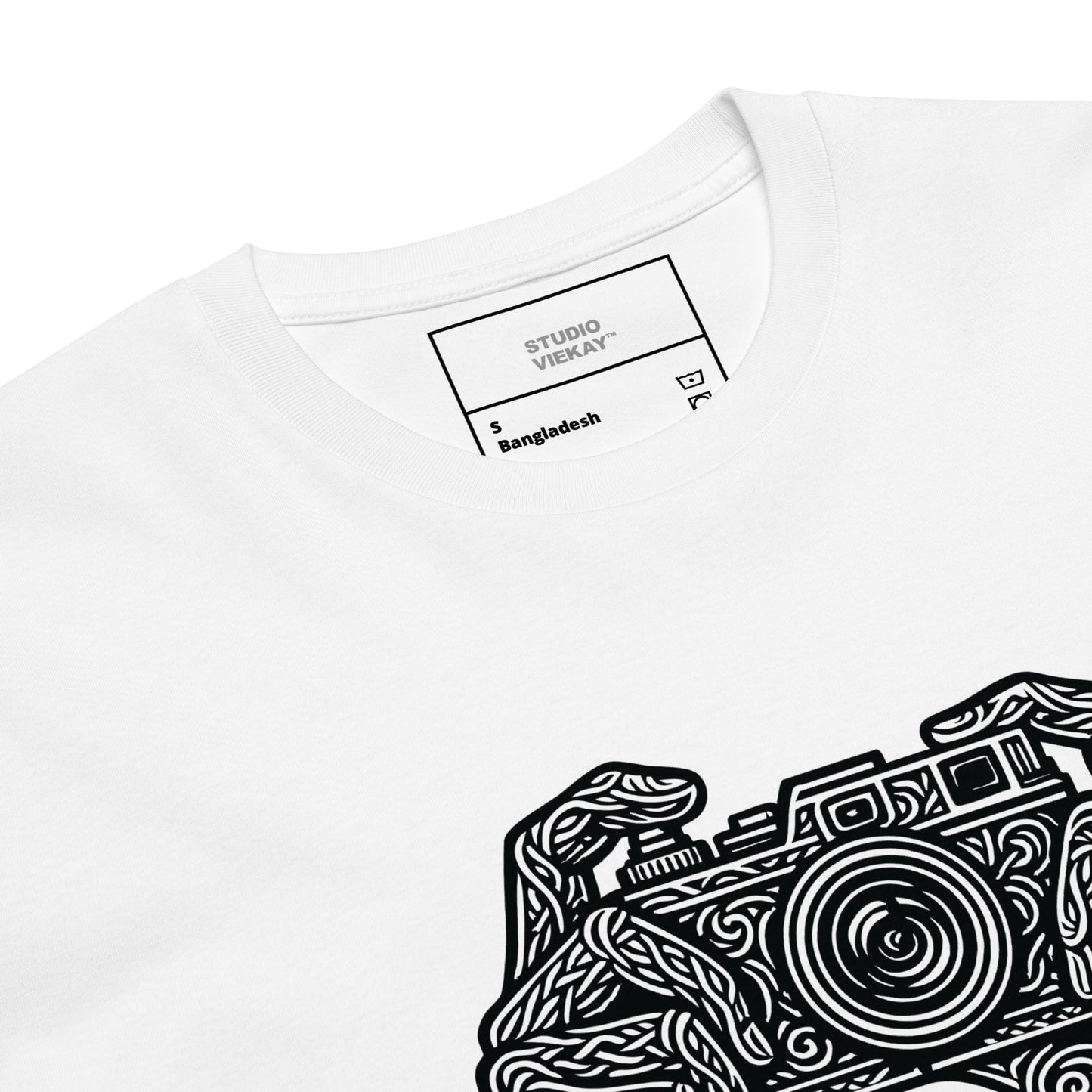 Close up comp of the Studio Viekay Camera Engraved Art Tee showing the detailed carved black linework and premium camera illustration in high contrast