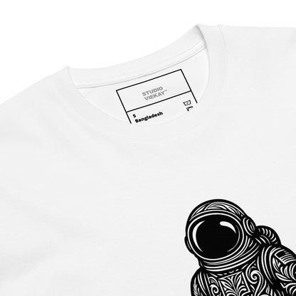 Close up comp of the Studio Viekay Astronaut Engraved Art Tee showing the detailed carved black linework and premium astronaut illustration in high contrast